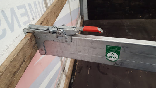 Spring Loaded Clamp Beam Resting on 2x6 Lumber Common in Europe 