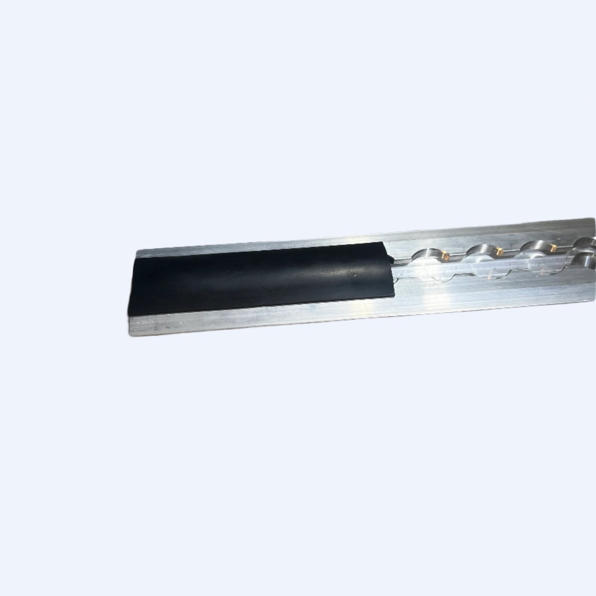 FE200751 | Plastic Filler Strip For L - Track PRICE PER FOOT - WheelchairStrap.com